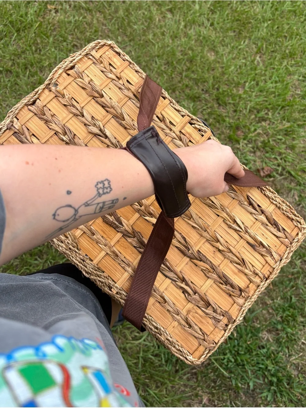 Woven Picnic Basket with Brown Straps and Leather Accents